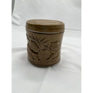 sheila Fournier tan pottery Tea canister with pandas and bamboo